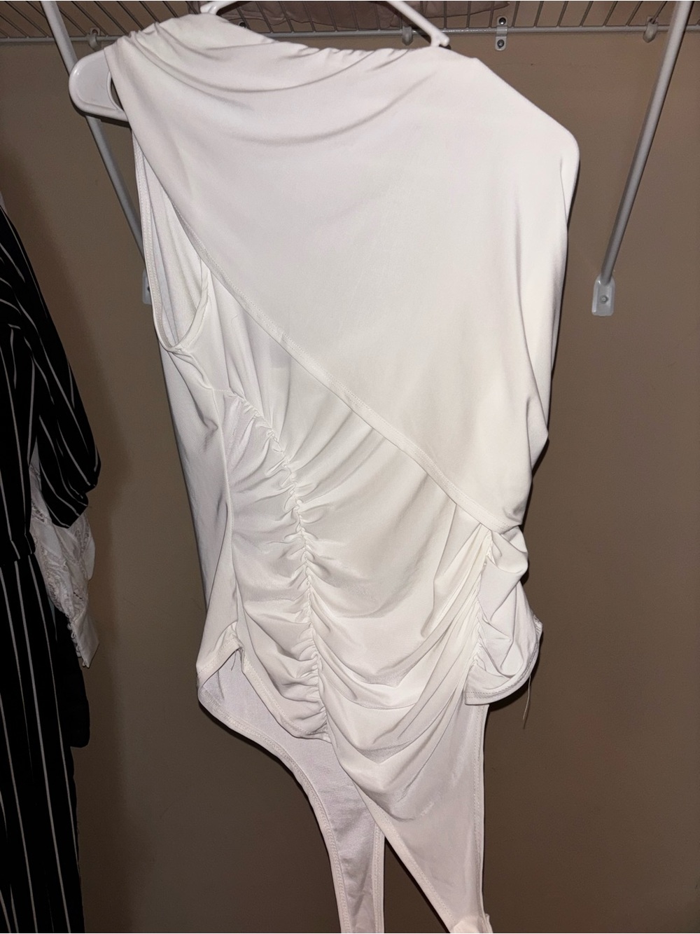 White bodysuit off the shoulder